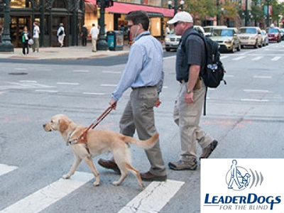 blind man with dog crossing street image